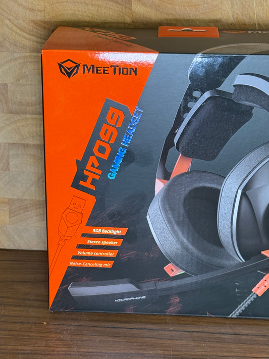 Meetion HP099 Gaming Headset with RGB Lights, USB, and Mic – Black & Orange